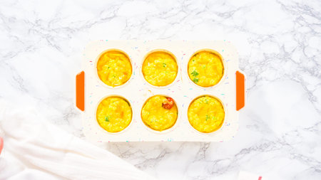 Step by step. Flat lay. Cooling fresh out of the oven bacon and cheese egg muffin.の写真素材