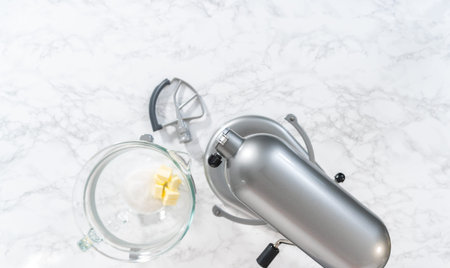 Lemon Cookies with White Chocolate. Flat lay. Mixing ingredients in kitchen mixer to bake lemon...