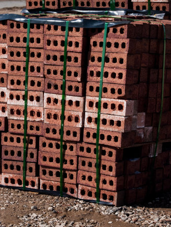 Stack of bricks at the construction site.の写真素材