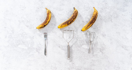 Flat lay. Three ways to mash overhyped bananas.の写真素材