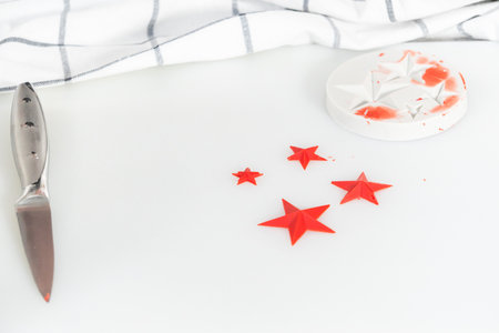 Filling star-shaped silicone mold with melted color chocolate.の写真素材