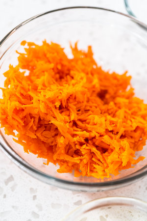 Flat lay. Measured ingredients in glass mixing bowls to bake turkey empanadas.の写真素材