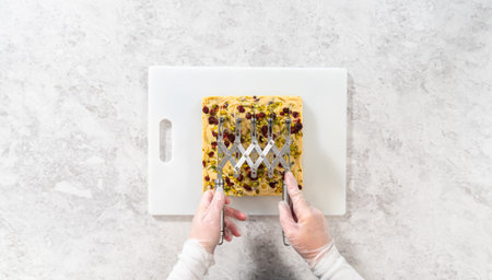 Flat lay. Storing cranberry pistachio fudge into the reusable plastic bag.の写真素材