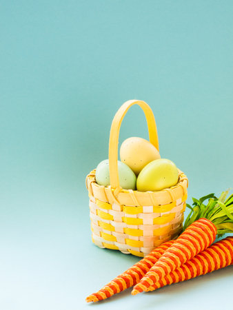 Box and basket with painted easter eggs.の写真素材