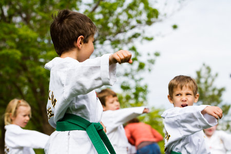 Tae Kwon Do student practicing in the park.のeditorial素材