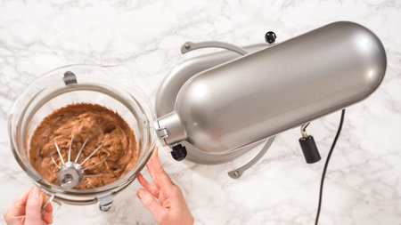 Flat lay. Step by step. Whipping chocolate ganache with an electric kitchen mixer.