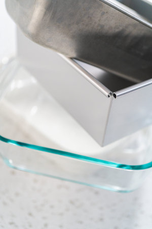Variety of clean baking pans on the kitchen counter.の写真素材