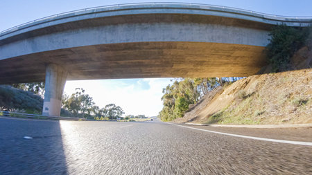 During the day, driving on HWY 101 near Arroyo Quemada Beach, California, offers scenic views of the surrounding coastal landscape.の写真素材