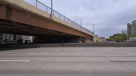 A dynamic view of the elevated highway overpass in South Denver, showcasing the intricate concrete...