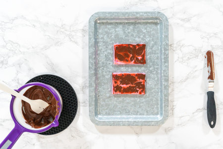 Flat lay. Making chocolate leaves from melted chocolate to decorate the pumpkin bundt cake.