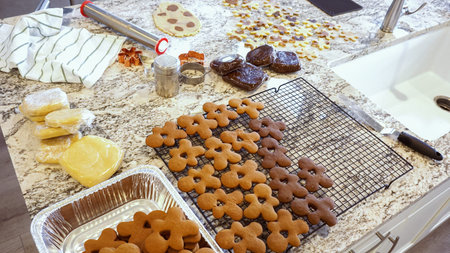 After baking to perfection, these delightful gingerbread cookies are now cooling gracefully on a...