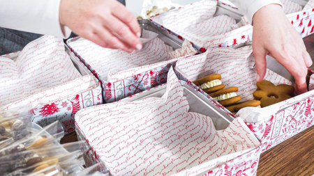 Lovingly homemade gingerbread and sugar cookies, half-dipped in rich chocolate, nestled in...