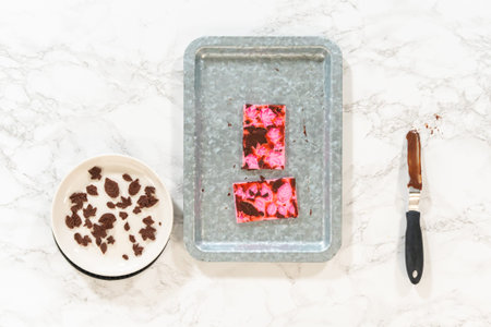 Flat lay. Making chocolate leaves from melted chocolate to decorate the pumpkin bundt cake.の写真素材