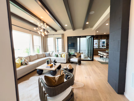 Parker, Colorado, USA-August 26, 2025 - A living room interior with a beige sectional sofa,...
