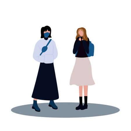 Two fashion schoolgirls standing together on a white isolatedのイラスト素材