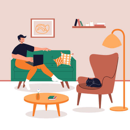 Young male character is sitting on the couch with a laptop. The cat is sitting on a chair. Home Office. Post-quarantine lifestyle. Vector illustration in flat style.のイラスト素材