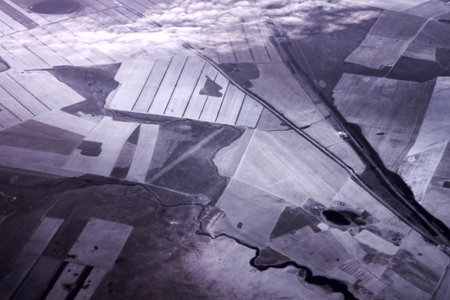 view of the ground from the plane window