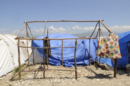 PORT-AU-PRINCE - AUGUST 28: The remains of a tent after a heavy rainfall, in Port-Au-Prince, Haiti on August 28, 2010.のeditorial素材