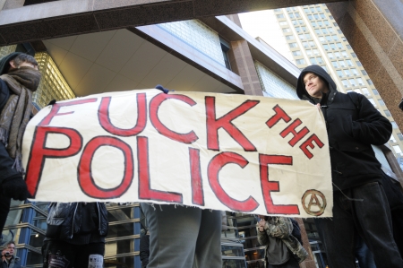TORONTO-MARCH 15: Unidentified protesters gathered in front the Toronto police Headquarter to celebrate the 17th International Day Against Police Brutality on March 15, 2013 in Toronto, Canada.のeditorial素材