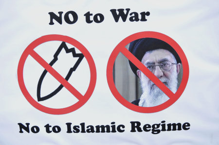 TORONTO - MARCH 11: A banner of anti war protestors which says \no war\ on iran during a protest on...