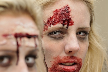 TORONTO-OCTOBER 20: A Toronto couple putting scary expression on their faces during the Halloween parade on October 20, 2012 in Toronto, Canada.のeditorial素材