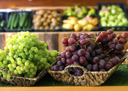 Fresh organic Vegetables and fruits on shelf in supermarket, farmers marketの写真素材