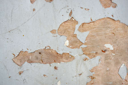 White wood plank as background. Grunge texture wallpaper. Peeling paint on an old wooden floor. Space for text in template. Empty concept.の写真素材