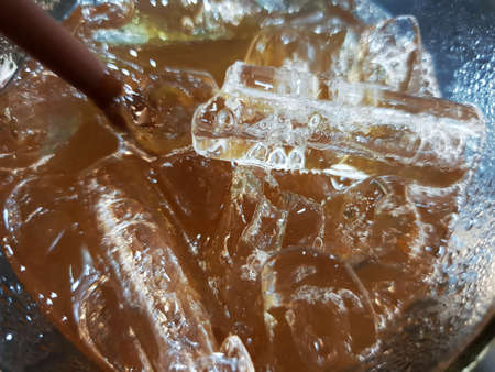 Top view of lemon ice tea in a glass, Abstract background, Summer drinksの写真素材