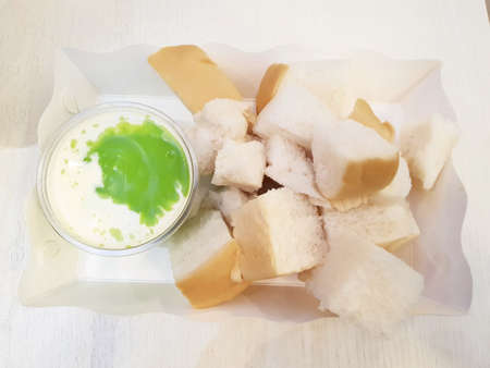 Top view of pandan custard bread isolated on white background (Sangkaya)