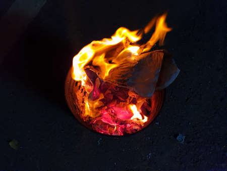 Burning paper to the ancestor respect and celebrate Chinese New Year, Burning paper in a...