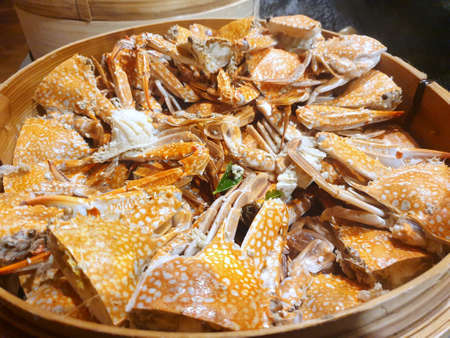 Top view of steamed crab on basket plate in restaurant, Ready to served or eating, as a backgroundの写真素材
