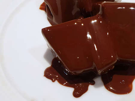 Top view of hot chocolate stick on white plate in in cafÃ©, Ready to eat or serve, Selective focus, Space for your textの写真素材