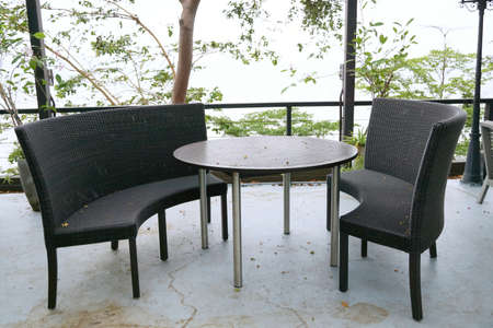 Luxury terrace balcony with dining table and chairs in a restaurant or resort, Outdoor area, Space...