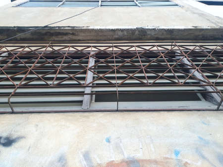 Looking up of old curved steel window in vintage place at Thailand, Copy space