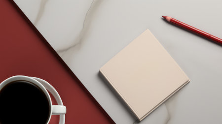 Cup of coffee and notepad on a red and white backgroundの素材