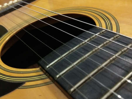 close up of a guitar's stringsの写真素材