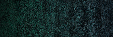Dark blue grunge textured wall background. Horizontal banner.