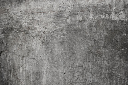 Old grunge wall texture background. Floor surface with scratches and cracksの写真素材