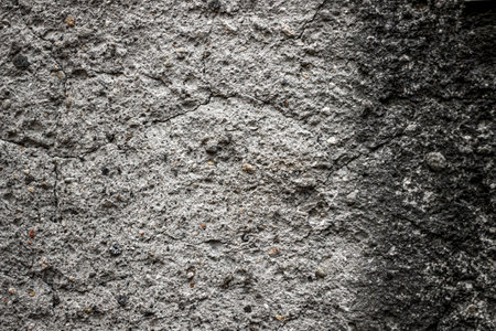Texture of old rustic wall covered with gray stucco. Abstract background for design.の写真素材