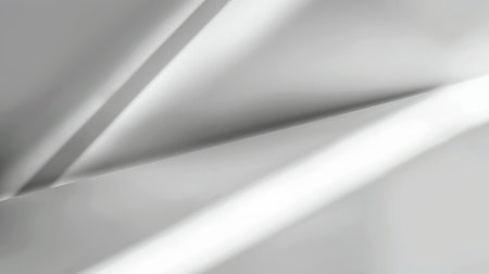 Detailed view of a shiny metallic surface reflecting light and shadows.の素材