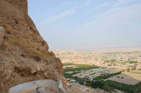 View of the city of Jericho from the mountains of temptation. Ancient and hot city at the foot of...