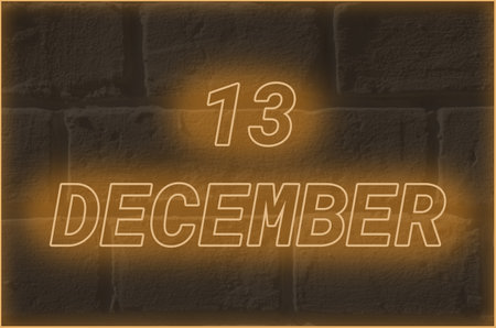 Calendar date on background of an old brick wall. 13 december written glowing font. The concept of an important date or holidayの写真素材