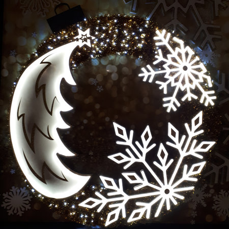 Glowing ball and snowflake on black background, Christmas and New Yearの写真素材