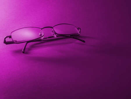 glasses, pink bacgroundの写真素材