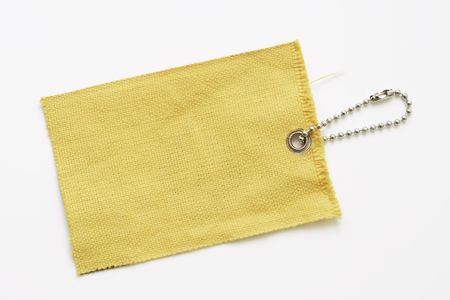 Label from little chain on white backgroundの写真素材