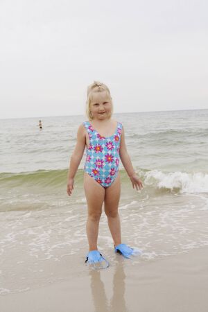 The child plays at the seasideの写真素材