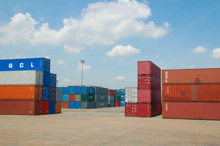 Bangkok, Thailand - Mar 14, 2006: Container Cargo freight ship with working crane bridge in shipyard at dusk for Logistic Import Exportのeditorial素材