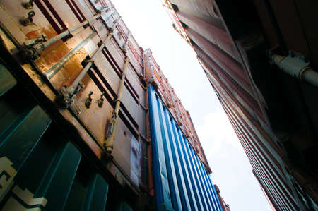 Bangkok, Thailand - Mar 14, 2006: Container Cargo freight ship with working crane bridge in shipyard at dusk for Logistic Import Exportのeditorial素材