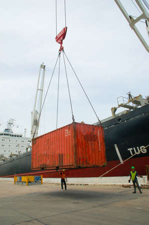 Bangkok, Thailand - Mar 16, 2006: the Port Authority of Thailand. With a cargo ship to harbor cranes...