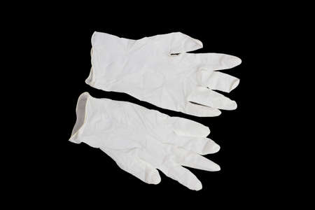 cleaning gloves oisolated on black background with cipping pathの写真素材